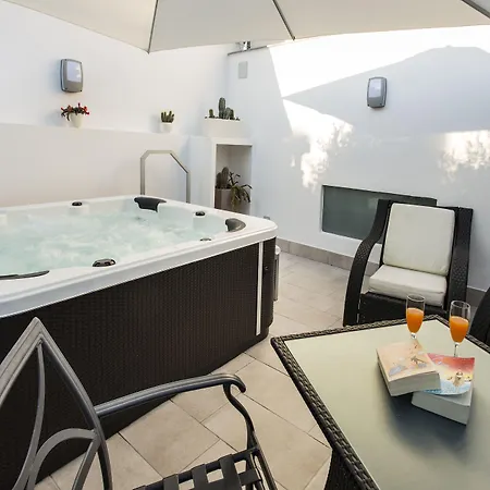 Appart hôtel Magi House Relais 4*